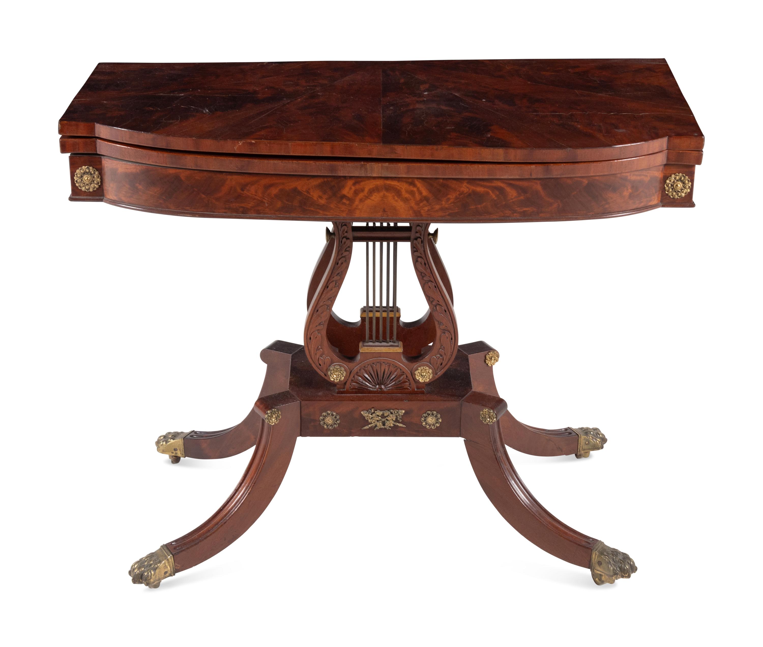 A Classical Gilt Metal Mounted Mahogany Flip-Top Table