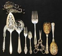 A Collection of Silver-Plate Serving Articles Length of longest 13 1/2 inches. — 20TH CENTURY