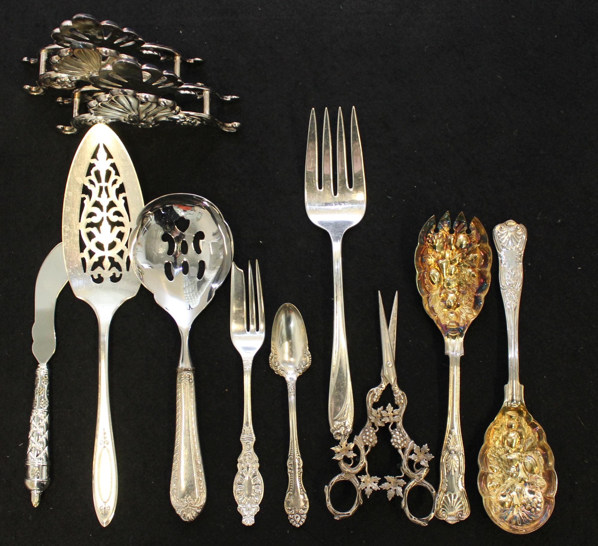 A Collection of Silver-Plate Serving Articles Length of longest 13 1/2 inches. — 20TH CENTURY