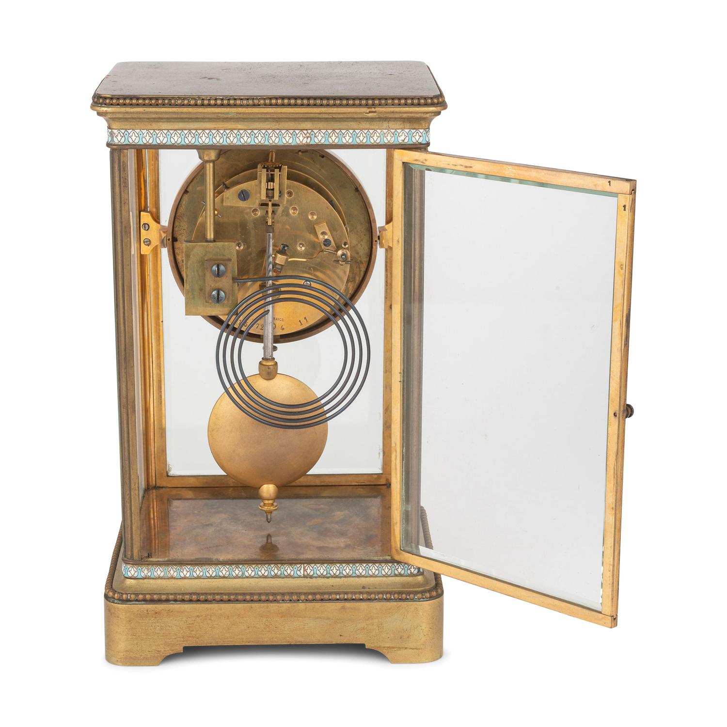 A Japy Freres Gilt Bronze and Champleve Clock