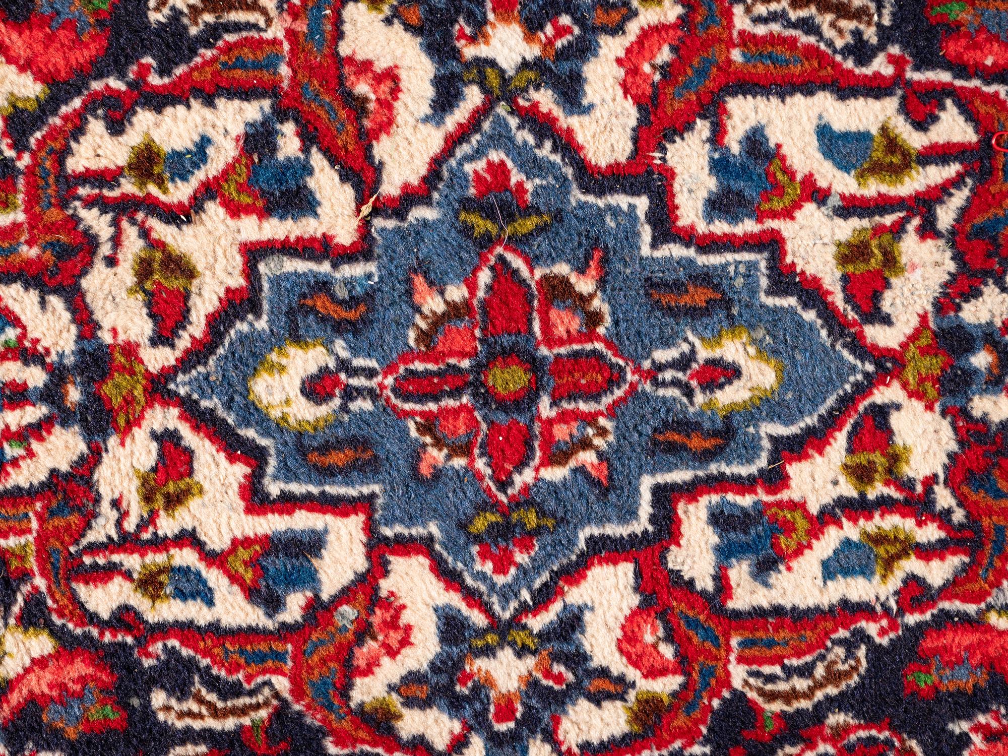 A Kashan Wool Rug