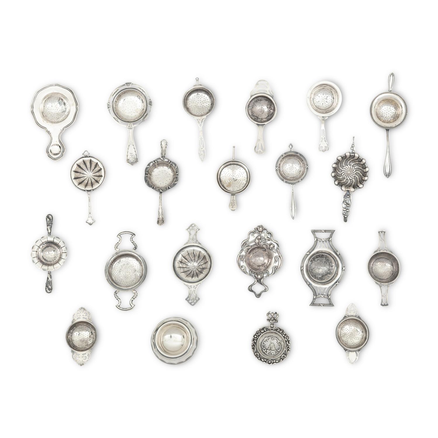 A Collection of Twenty Silver Tea Strainers