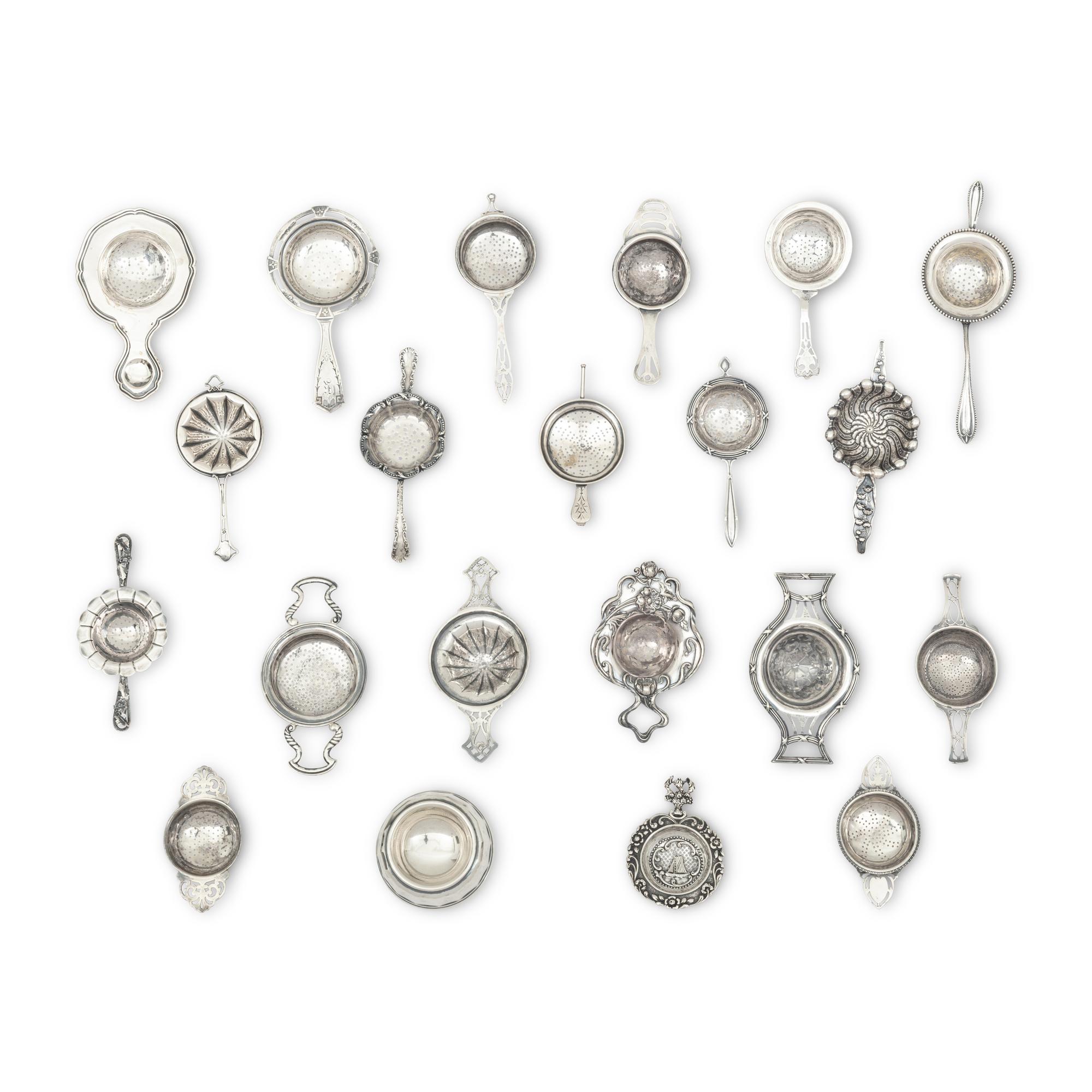 A Collection of Twenty Silver Tea Strainers
