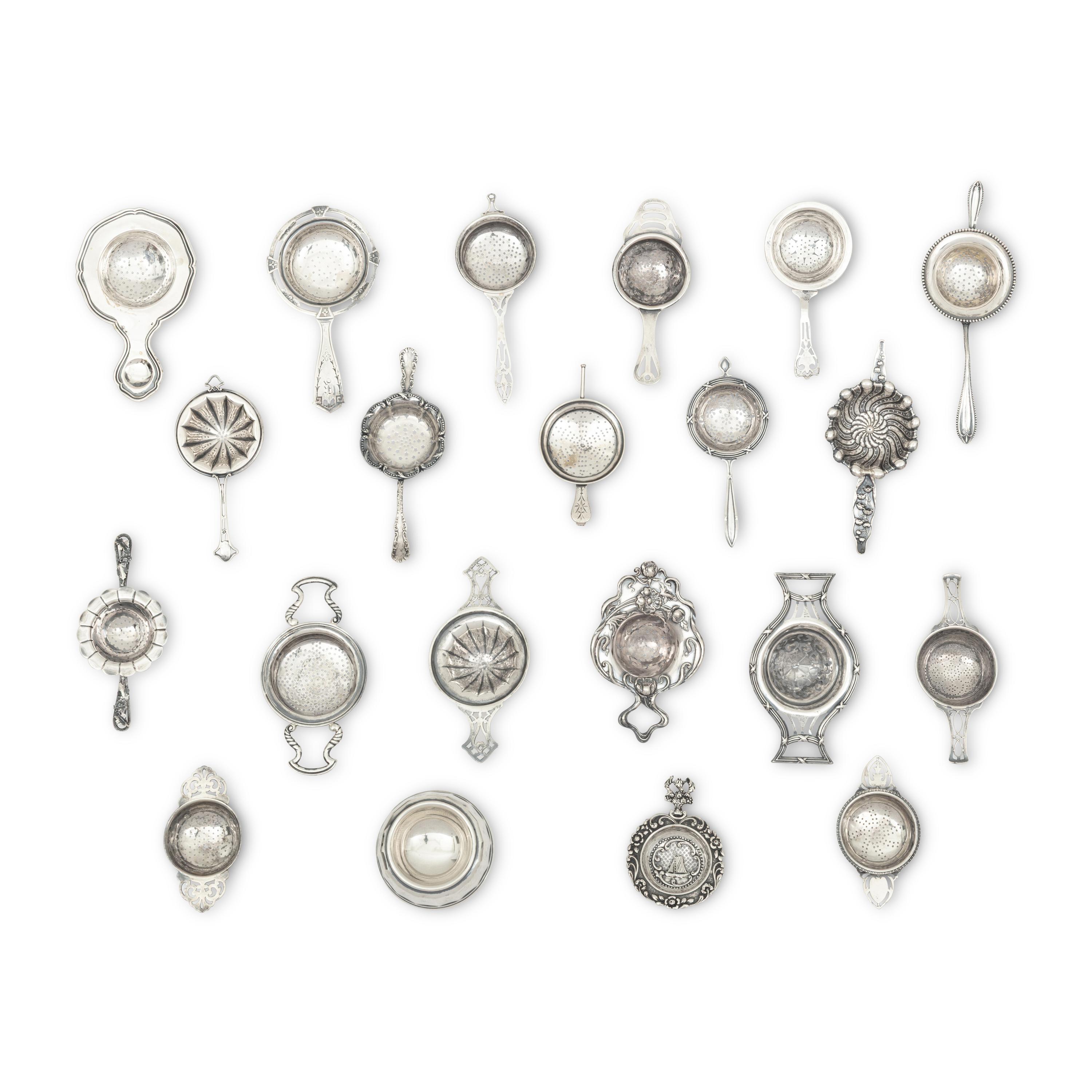 A Collection of Twenty Silver Tea Strainers