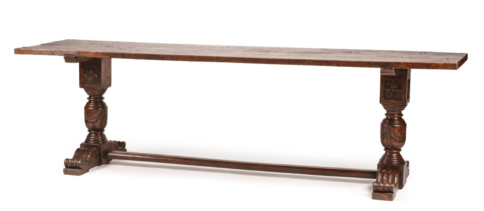 A Renaissance Revival Library Table Height 31 1/2 x length 108 1/2 x depth 28 1/2 inches.