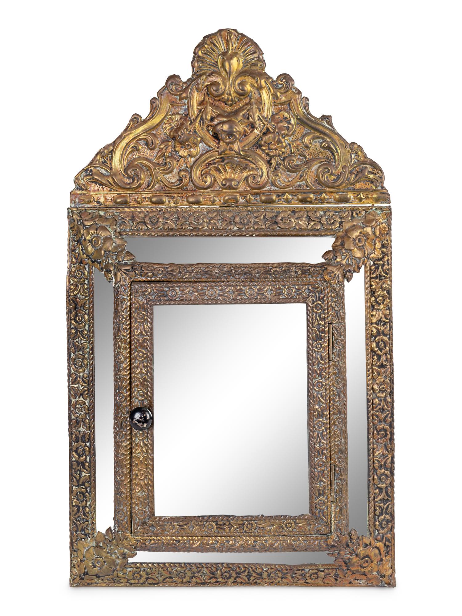A Dutch Baroque Style Repousséd Brass Bride's Vanity Mirror — 19TH CENTURY