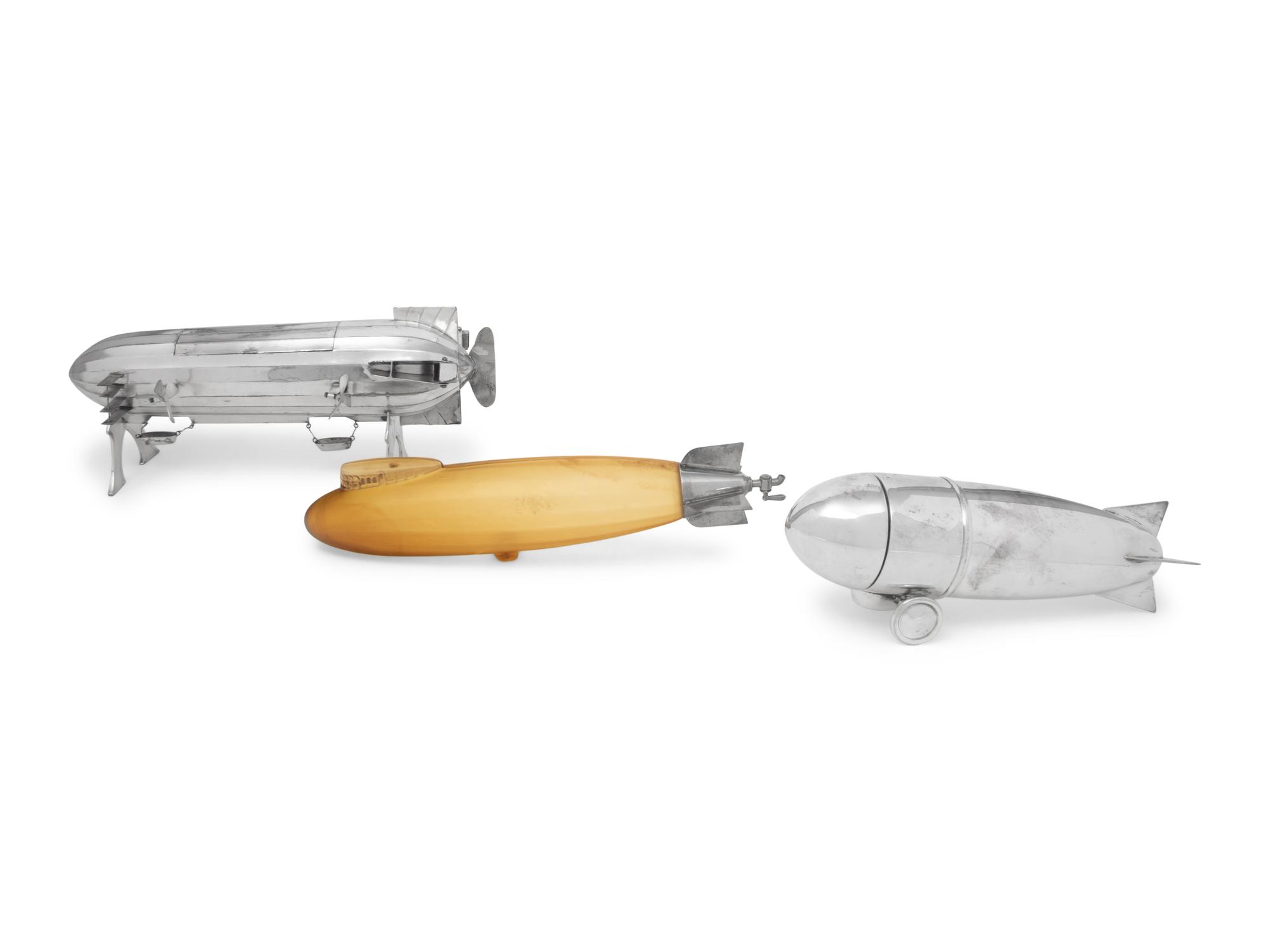 A Group of Three Blimp-Form Table Articles
