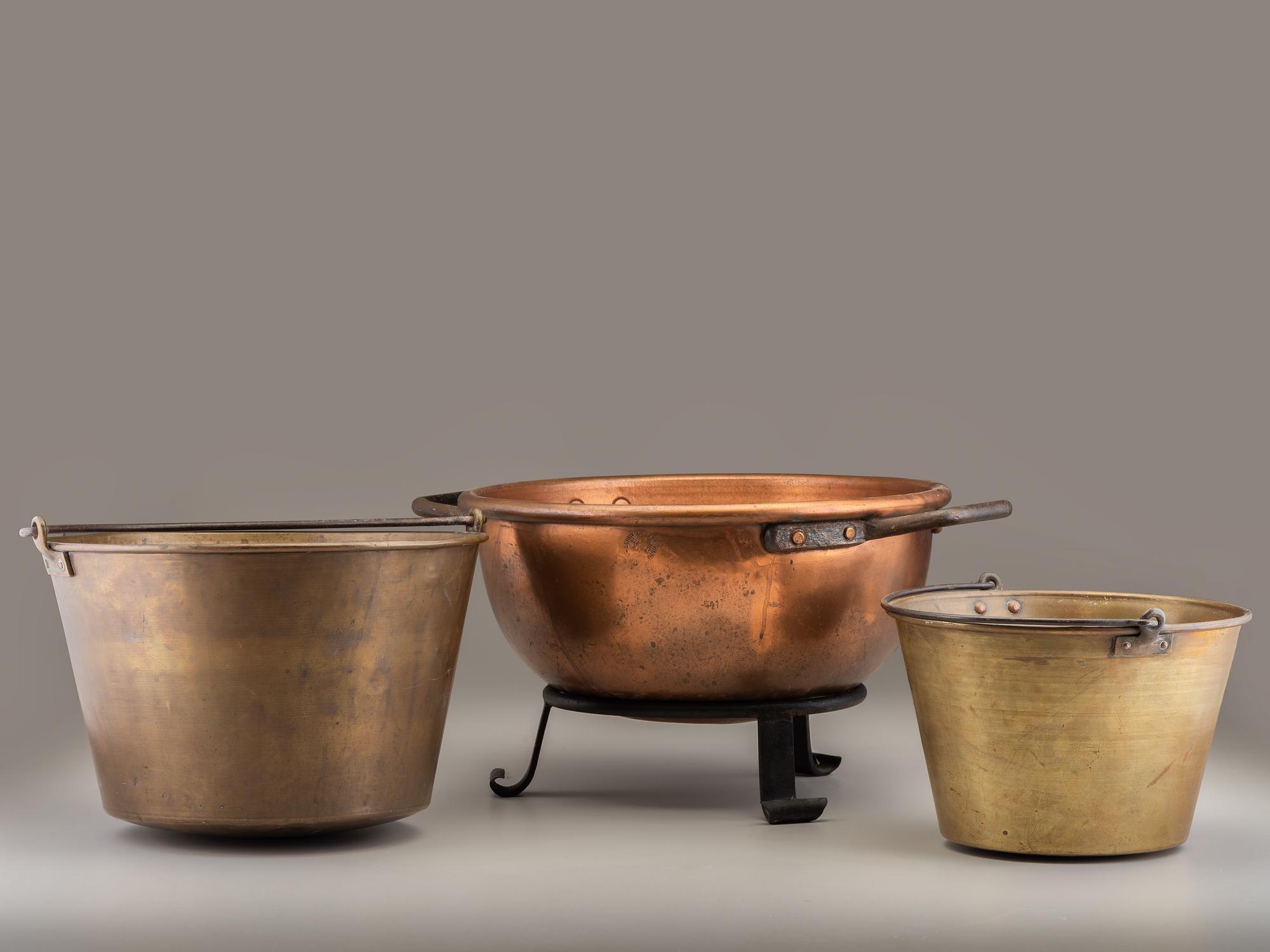 A Copper and Wrought Iron Bowl and Two Spun Brass Buckets