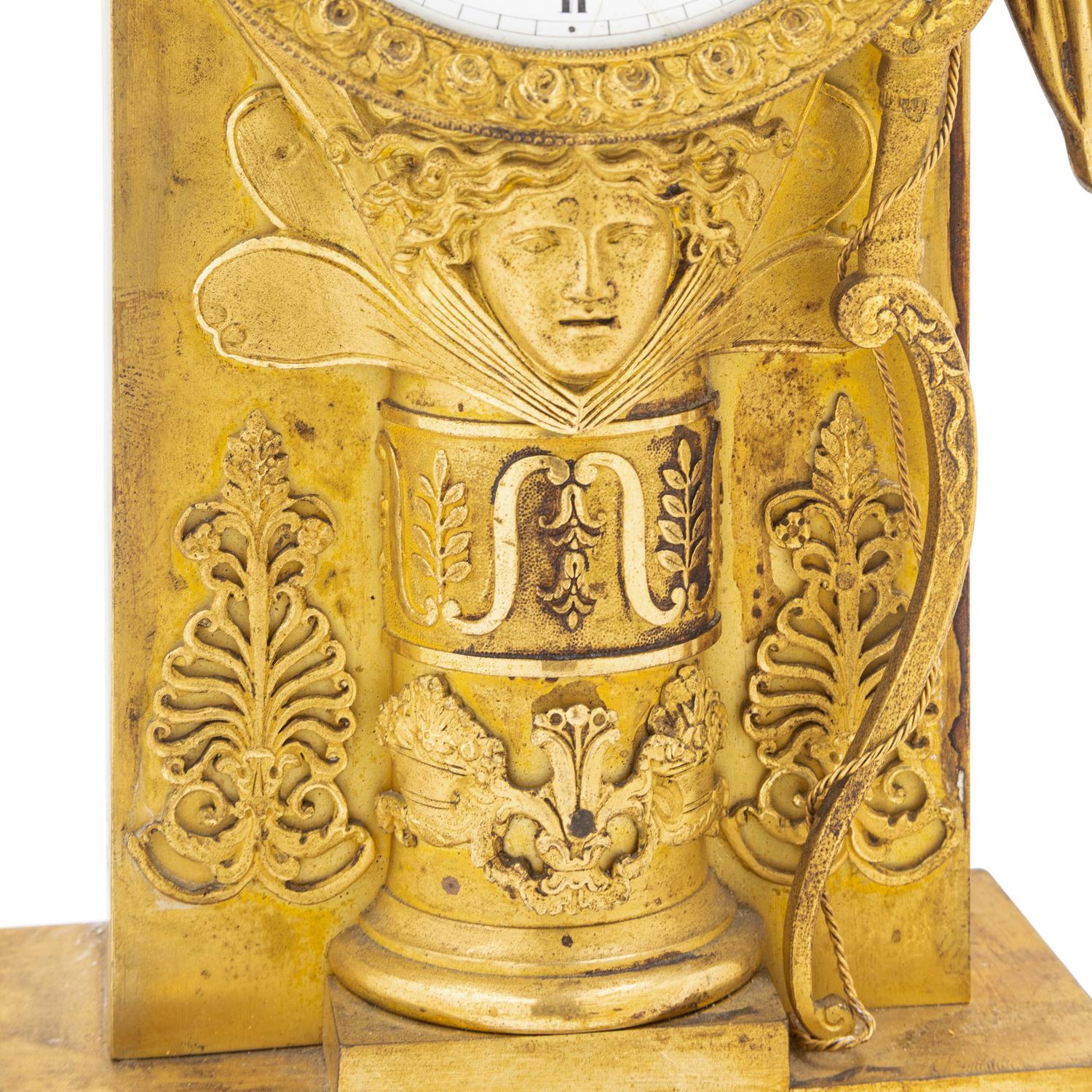 An Empire Gilt Bronze Clock