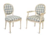 A Set of Ten Louis XVI Style Painted Dining Chairs — 20TH CENTURY