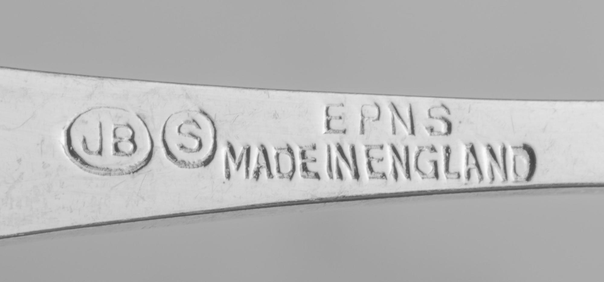 A Collection of Silver and Silver-Plate Flatware Articles