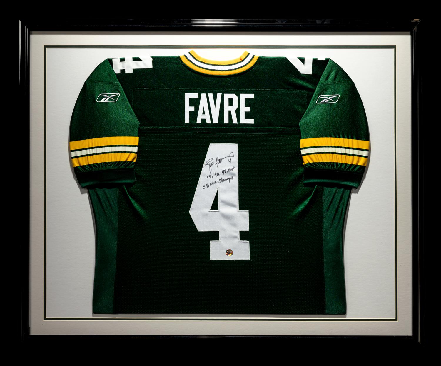 A Group of Brett Favre Signed Green Bay Packers Items,