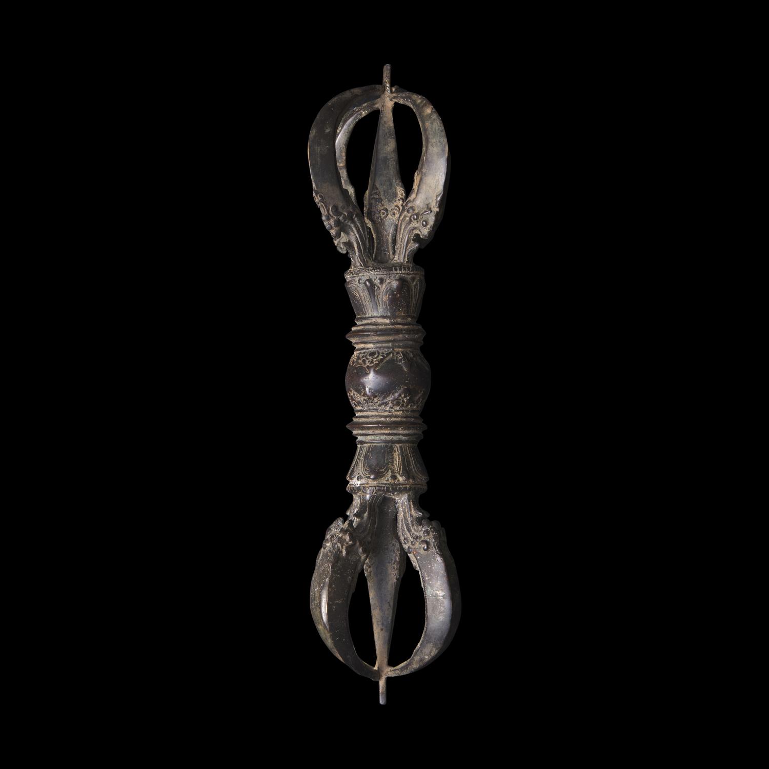 A Large Tibetan Patinated Bronze Vajra