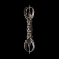 A Large Tibetan Patinated Bronze Vajra