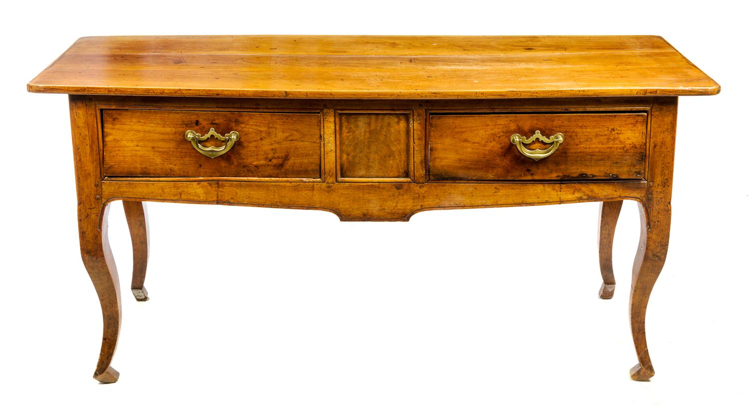 A French Provincial Walnut Farm Table Height 31 1/2 x width 65 x depth 24 1/2 inches. — 19TH CENTURY