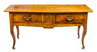 A French Provincial Walnut Farm Table Height 31 1/2 x width 65 x depth 24 1/2 inches. — 19TH CENTURY