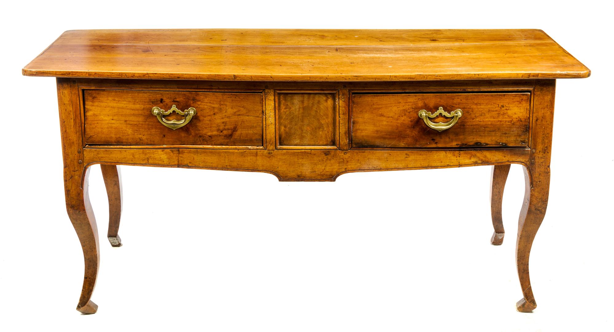 A French Provincial Walnut Farm Table Height 31 1/2 x width 65 x depth 24 1/2 inches. — 19TH CENTURY