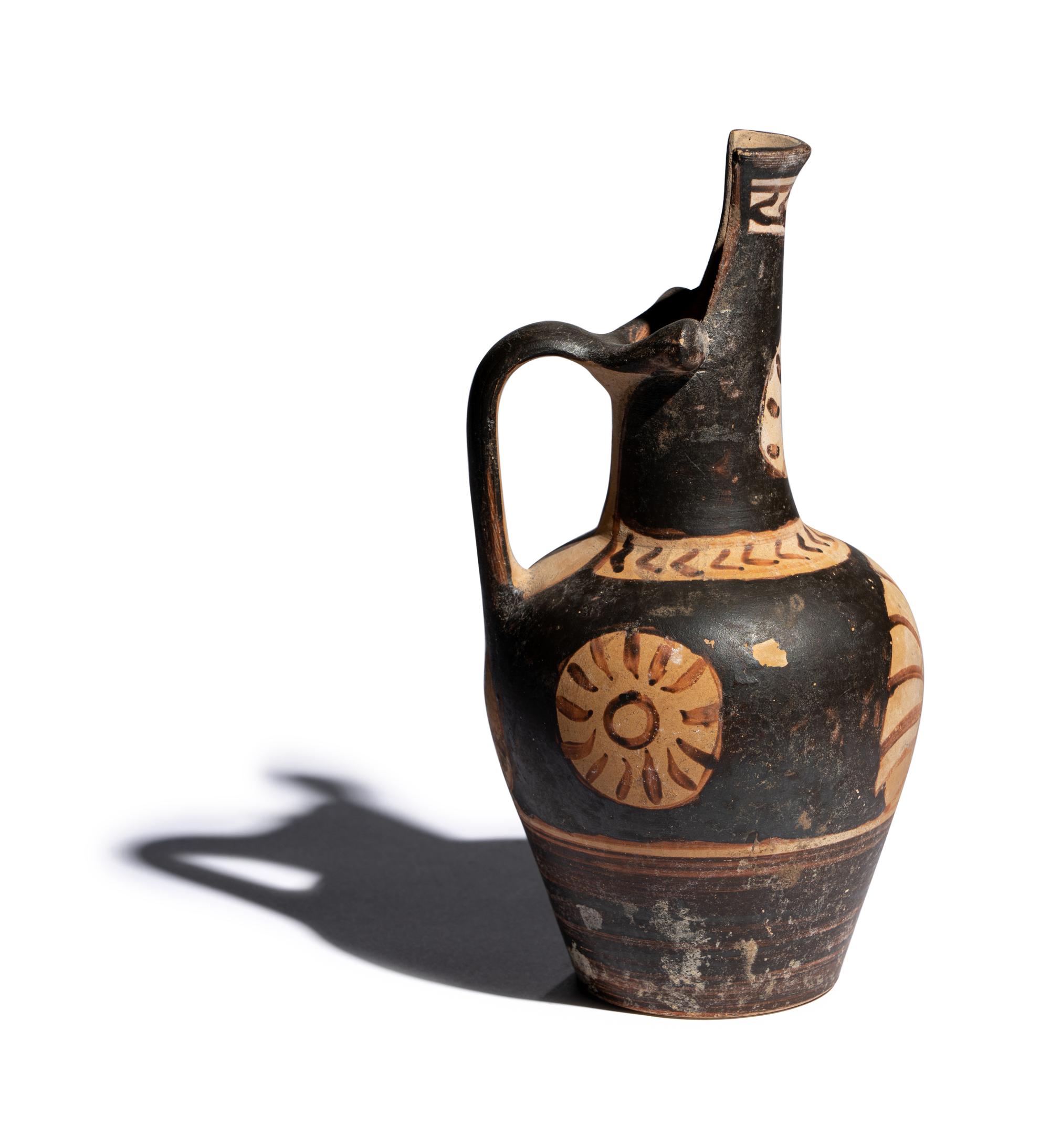 An Etruscan Red-Figured Beak-Spouted Oinochoe