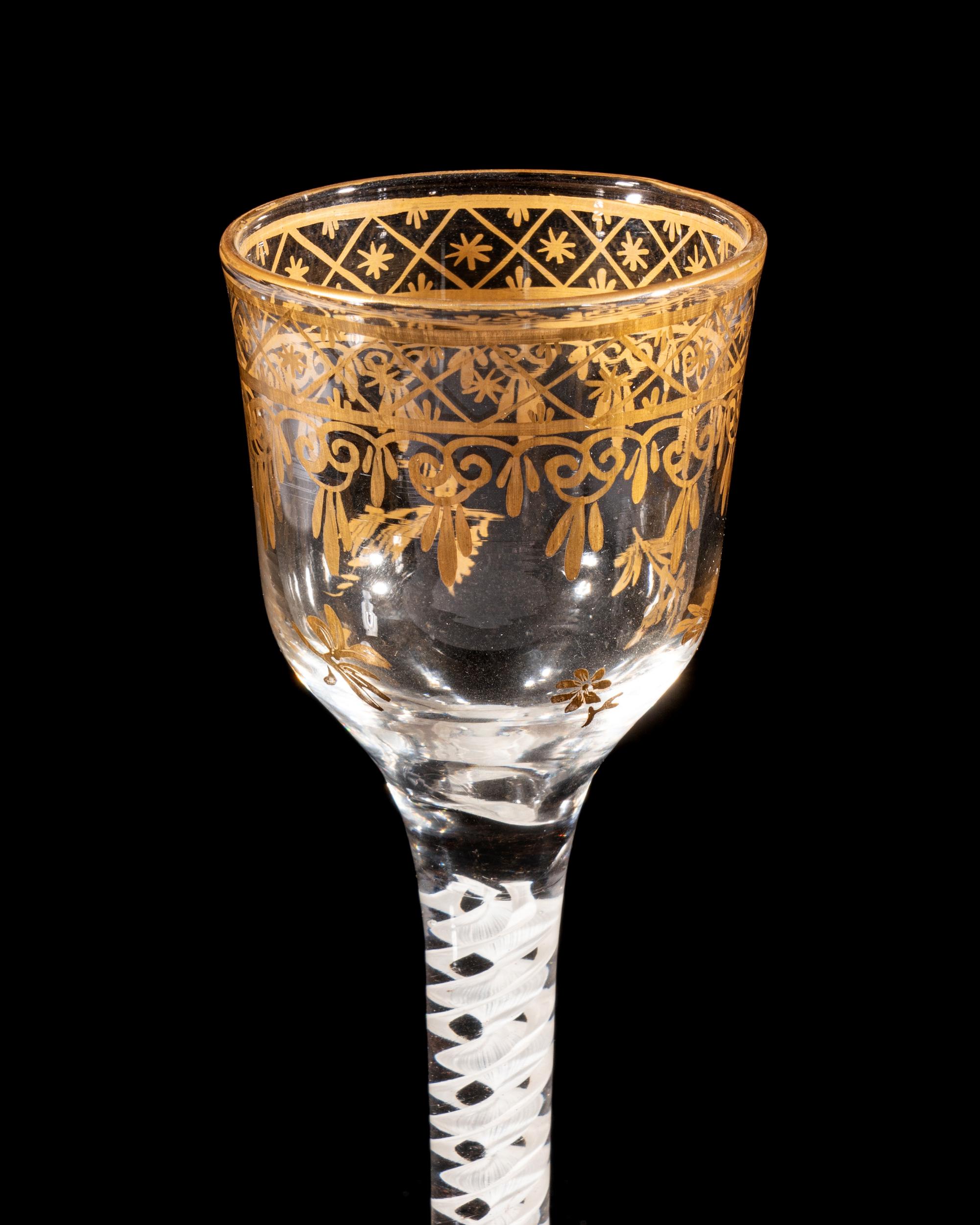 A Giles Gilt Decorated Opaque Twist Wine Glass