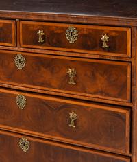 A William and Mary Oyster Walnut Chest of Drawers