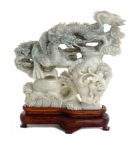 A Burmese Carved Jade Figural Group Height 7 1/4 inches. — 20TH CENTURY