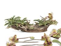 A Boehm Porcelain Orchid and Hummingbird Centerpiece