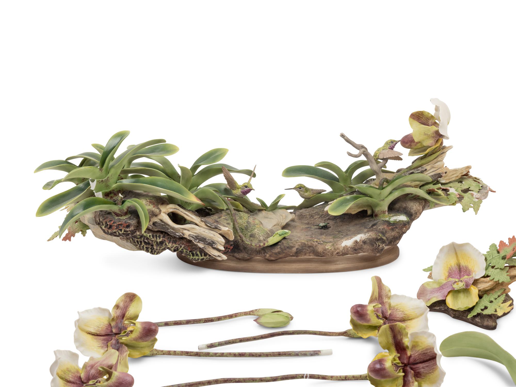 A Boehm Porcelain Orchid and Hummingbird Centerpiece