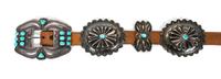 A Silver and Turquoise Concha Belt Length overall 41 inches; buckle height 3 x width 4 inches.