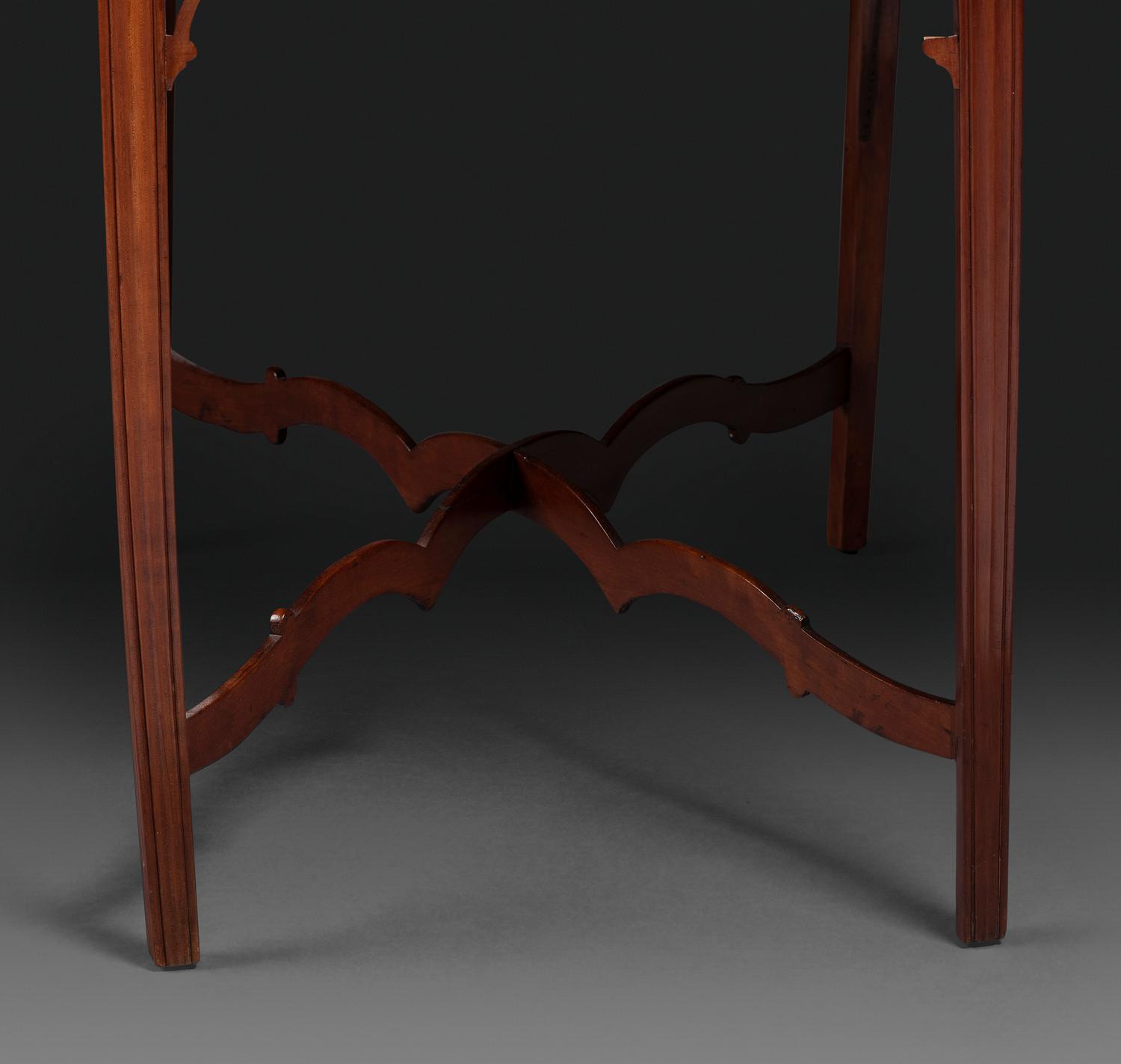 A Late Chippendale Carved Cherrywood Stretcher-Base Pembroke Table