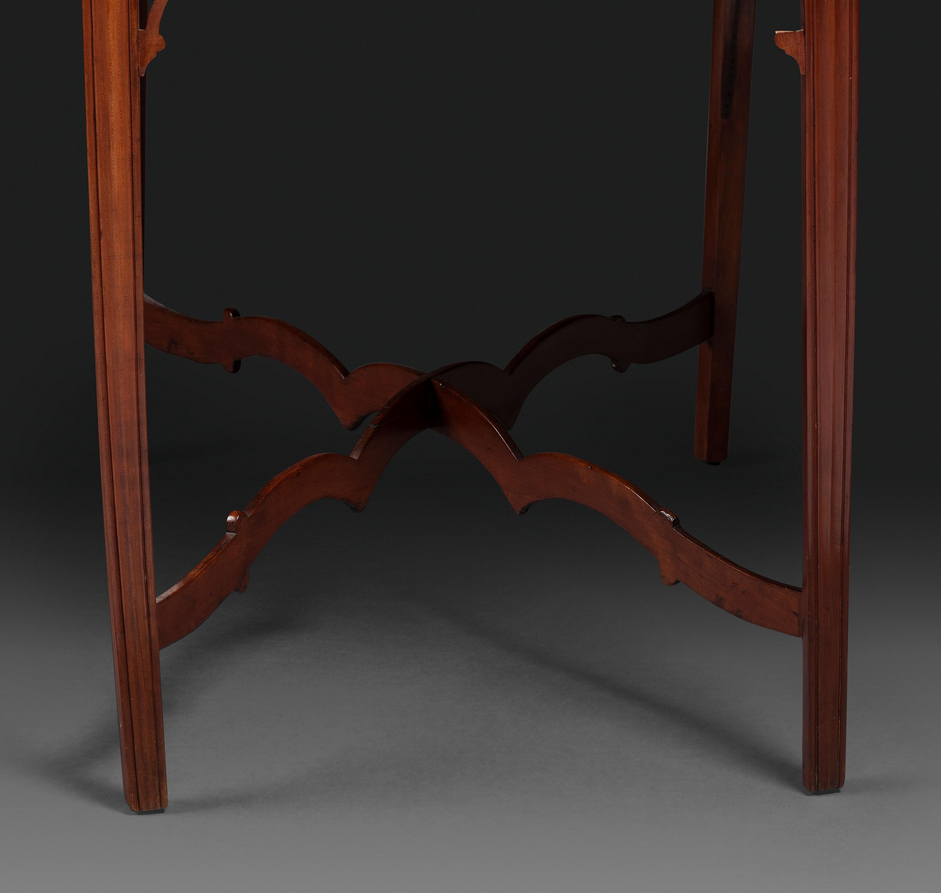 A Late Chippendale Carved Cherrywood Stretcher-Base Pembroke Table