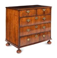 A George II Walnut and Marquetry Chest of Drawers