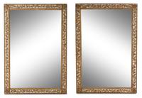 A Pair of Continental Painted and Parcel Gilt Mirrors Height 62 x width 42 inches. — 19TH CENTURY