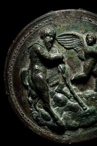 A Greek Bronze Box Mirror with Pan and Eros