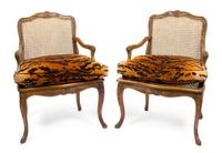 A Pair of Louis XV Style Oak Bergeres Height 35 x width 25 x depth 18 1/2 inches. — FIRST QUARTER 20TH CENTURY