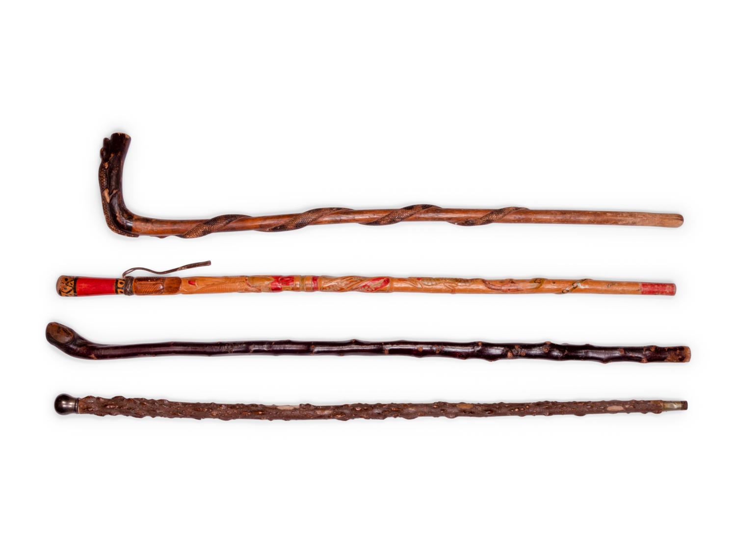 A Folk Art Snake and Alligator Carved Walking Stick
