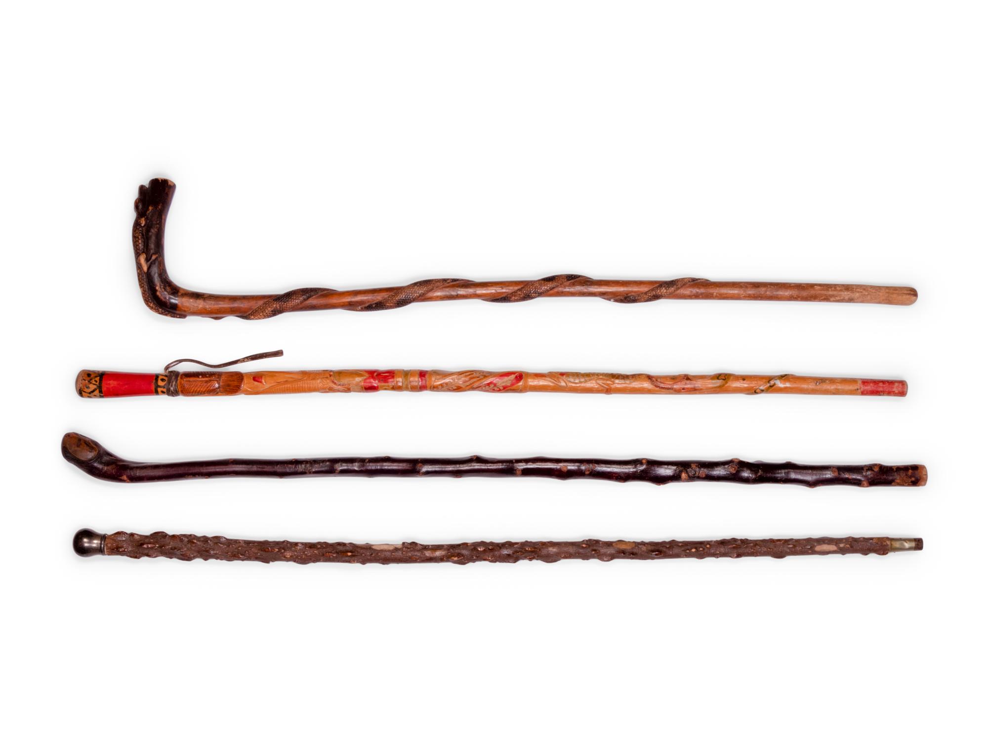 A Folk Art Snake and Alligator Carved Walking Stick