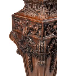 A Pair of Italian Baroque Style Carved Wood Marble-Top Pedestals