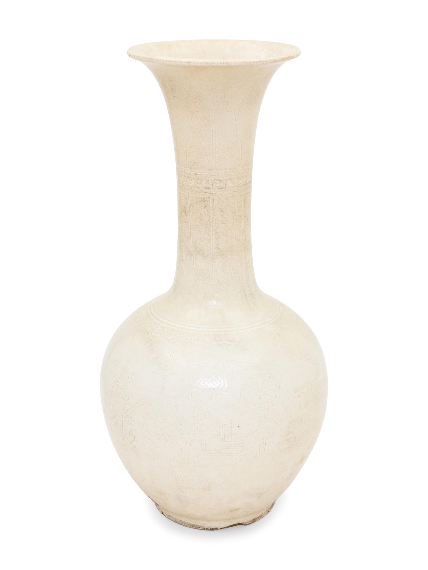 Two White Glazed Anhua Decorated Vases