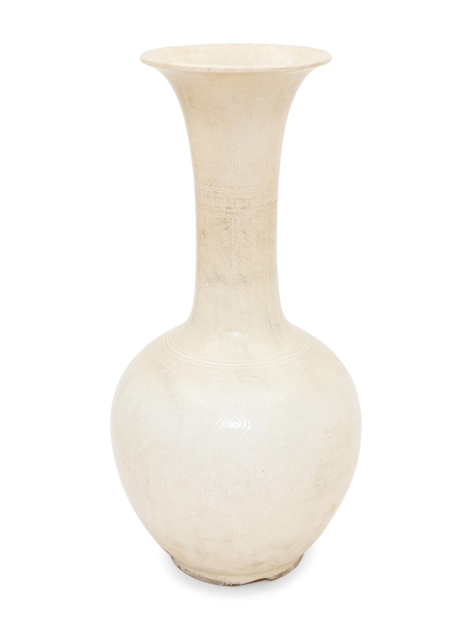 Two White Glazed Anhua Decorated Vases