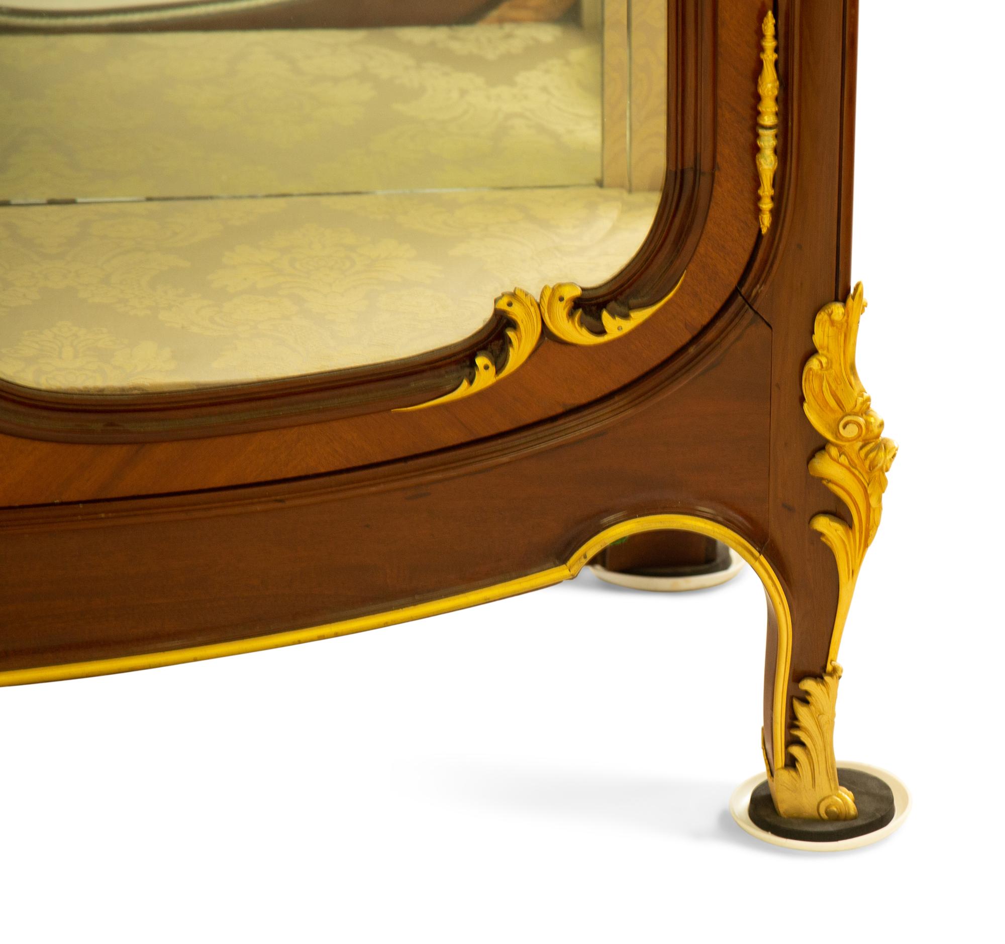 A Louis XV Style Gilt Bronze Mounted Mahogany Vitrine Cabinet