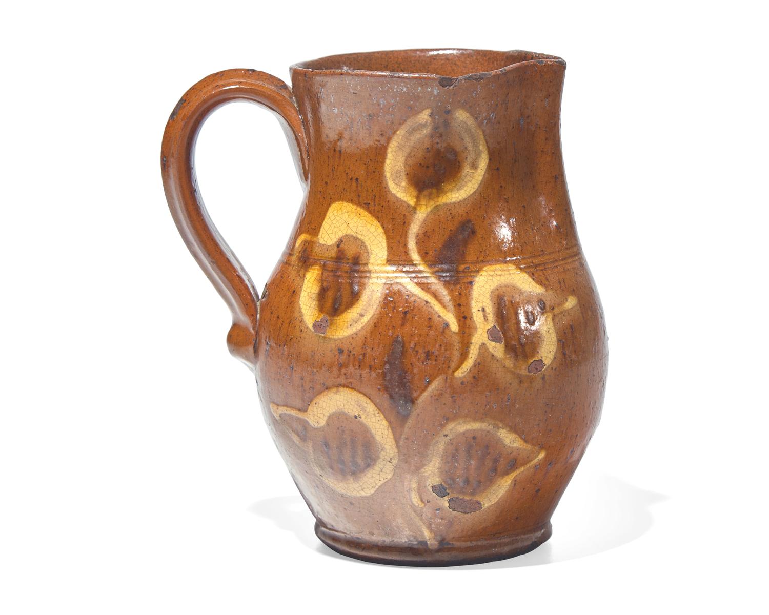 A Glazed and Slip-Decorated Redware Pitcher, Berks County, Pennsylvania, 19th Century