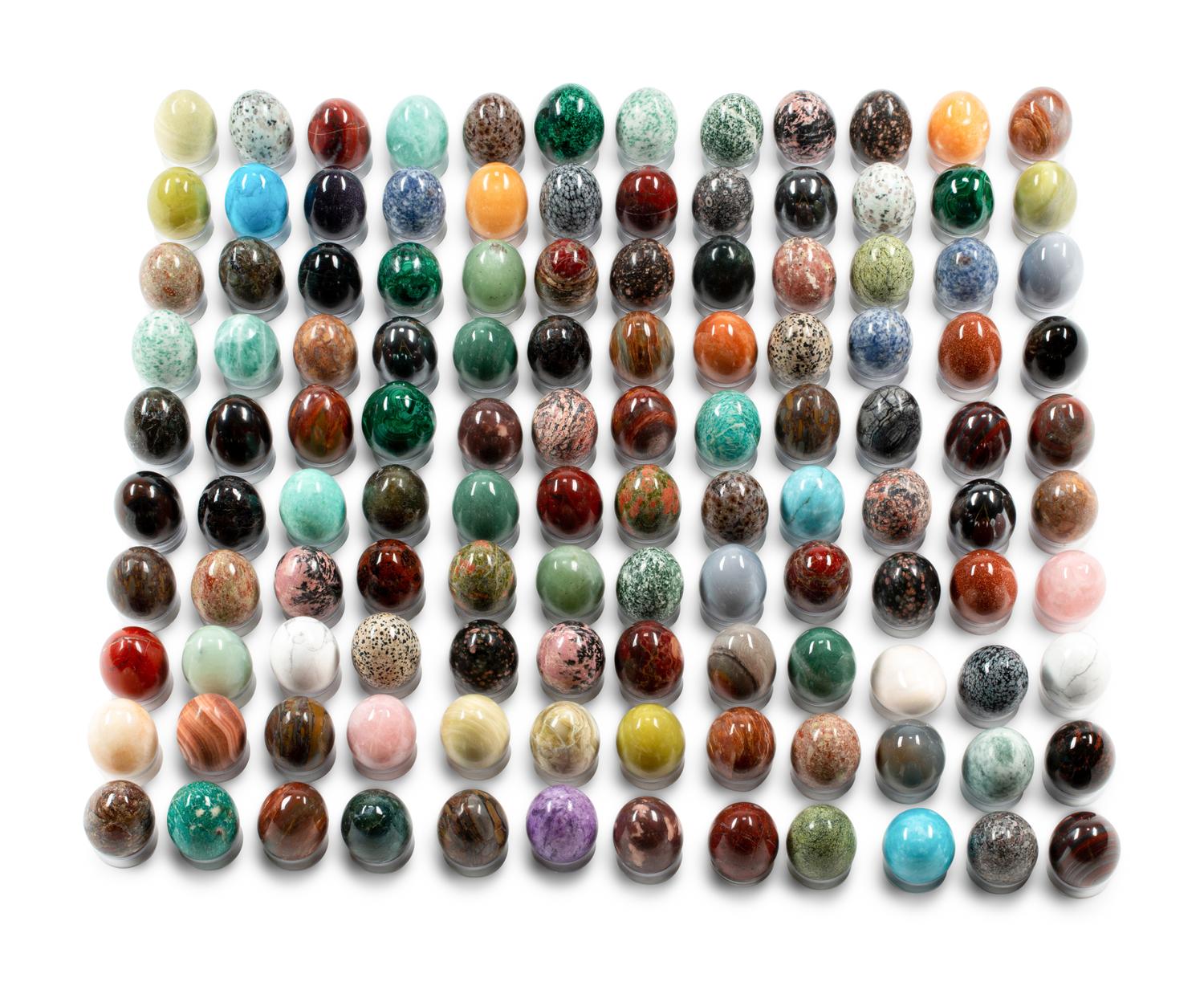 A Collection of Grand Tour Style Hardstone and Semi-Precious Stone Egg Ornaments