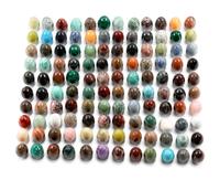 A Collection of Grand Tour Style Hardstone and Semi-Precious Stone Egg Ornaments