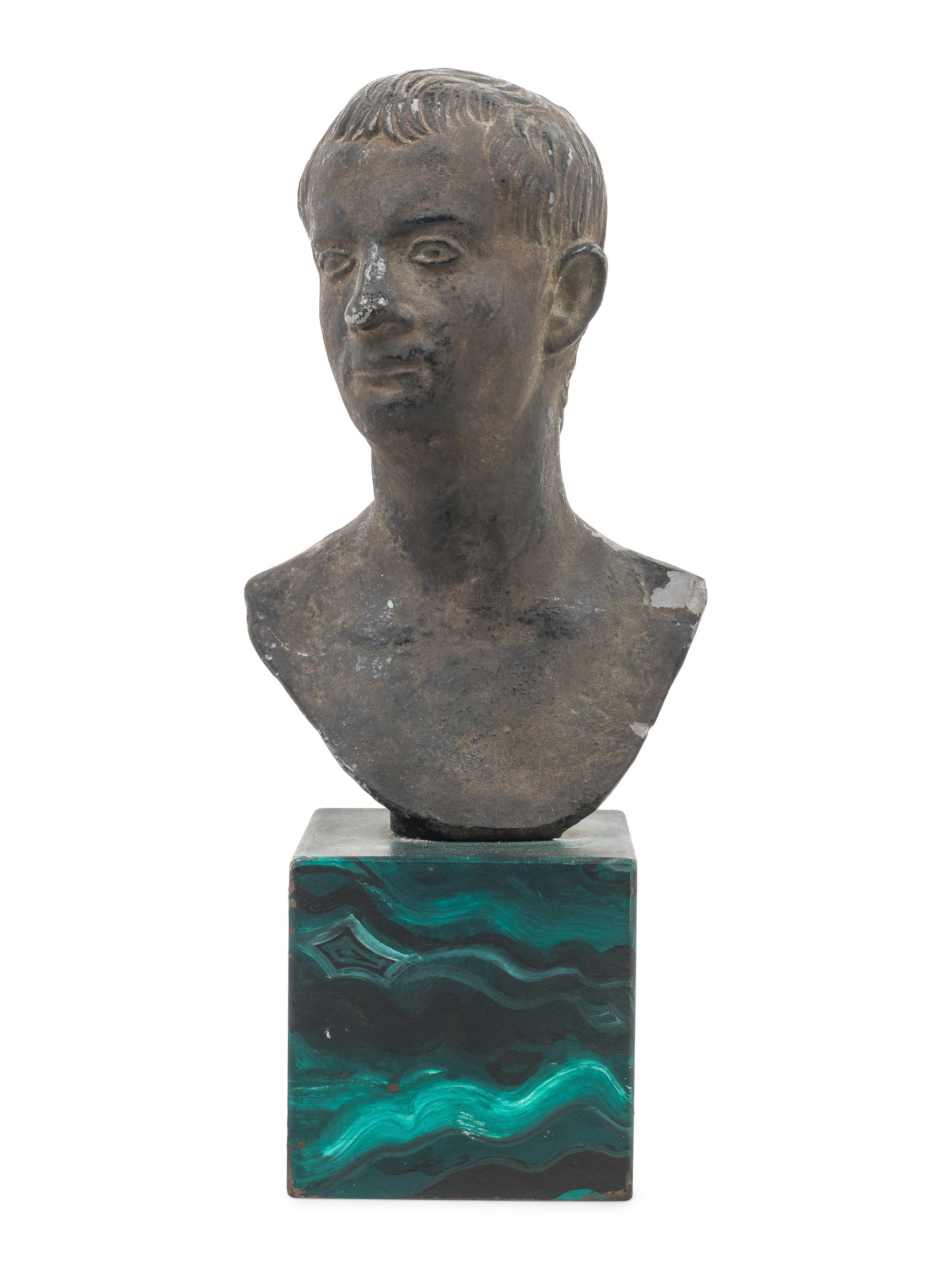 A Cast Metal Bust of a Man