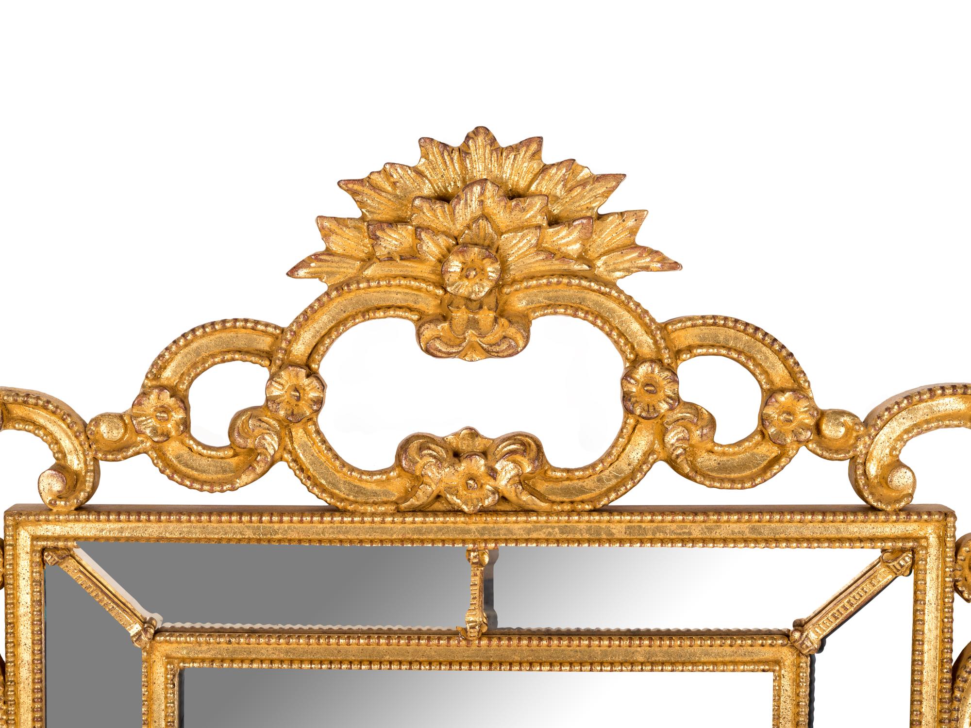 An Italian Baroque Style Giltwood Mirror