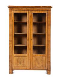 A Pair of Biedermeier Figured Birch Bookcases