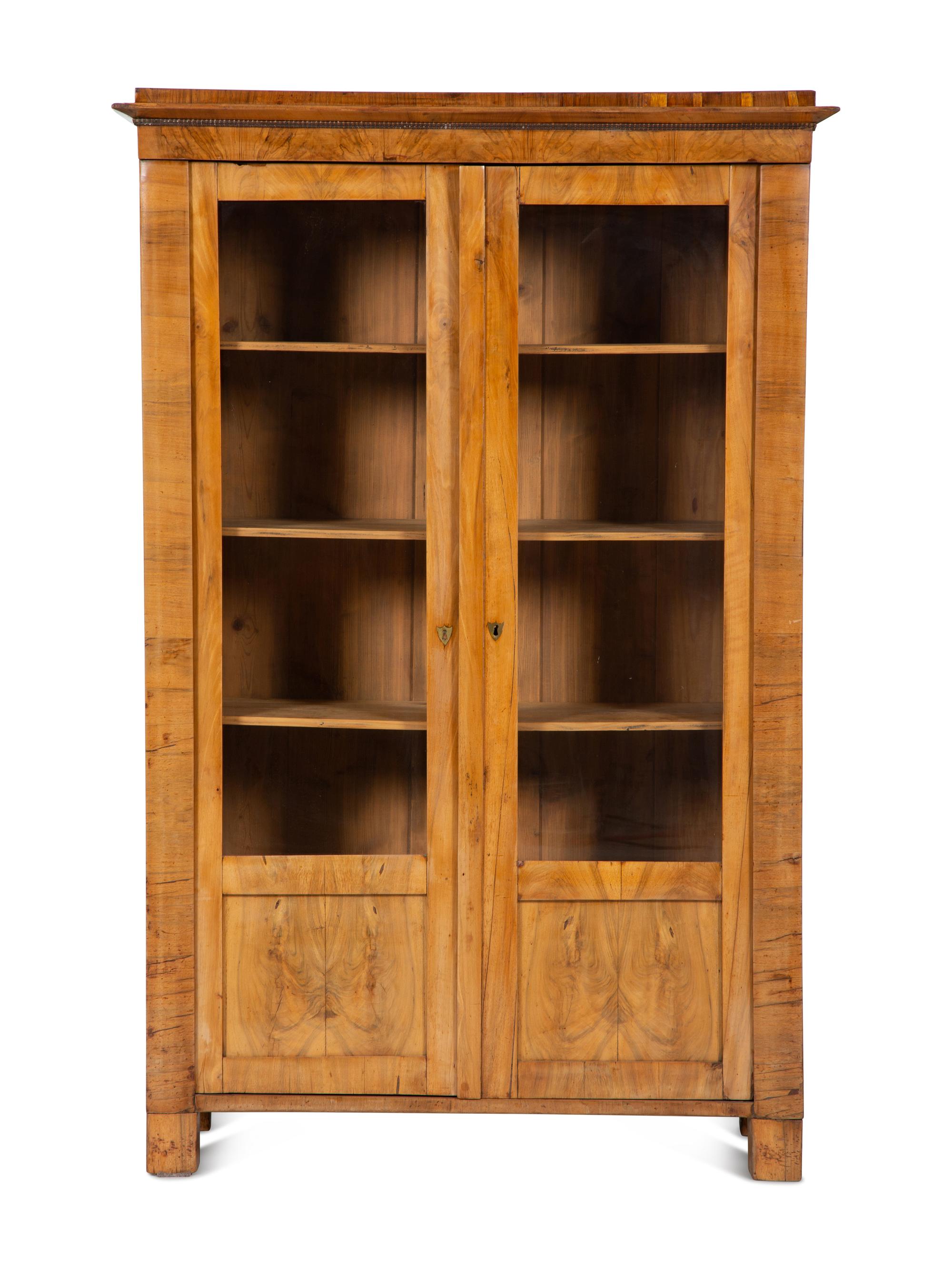 A Pair of Biedermeier Figured Birch Bookcases