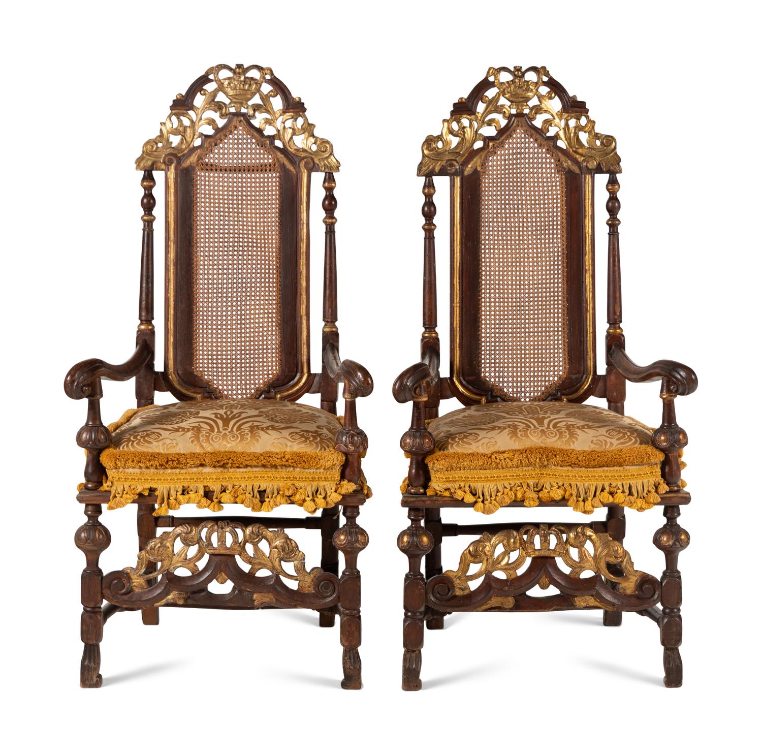 A Pair of William and Mary Style Parcel Gilt Caned and Pierced-Carved Beechwood Armchairs