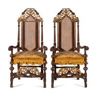 A Pair of William and Mary Style Parcel Gilt Caned and Pierced-Carved Beechwood Armchairs