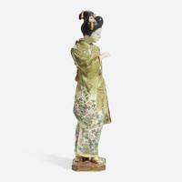 A Japanese enameled Satsuma-type pottery figure of a bijin, Kinkozan studios late 19th/early 20th Century